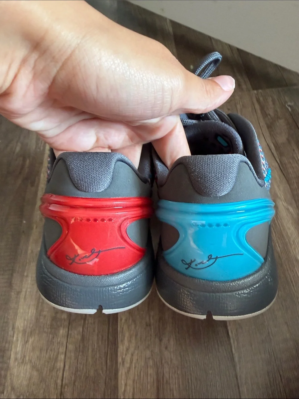 Kobe Bryant Basketball Shoes in Grey with Red & Teal Accents